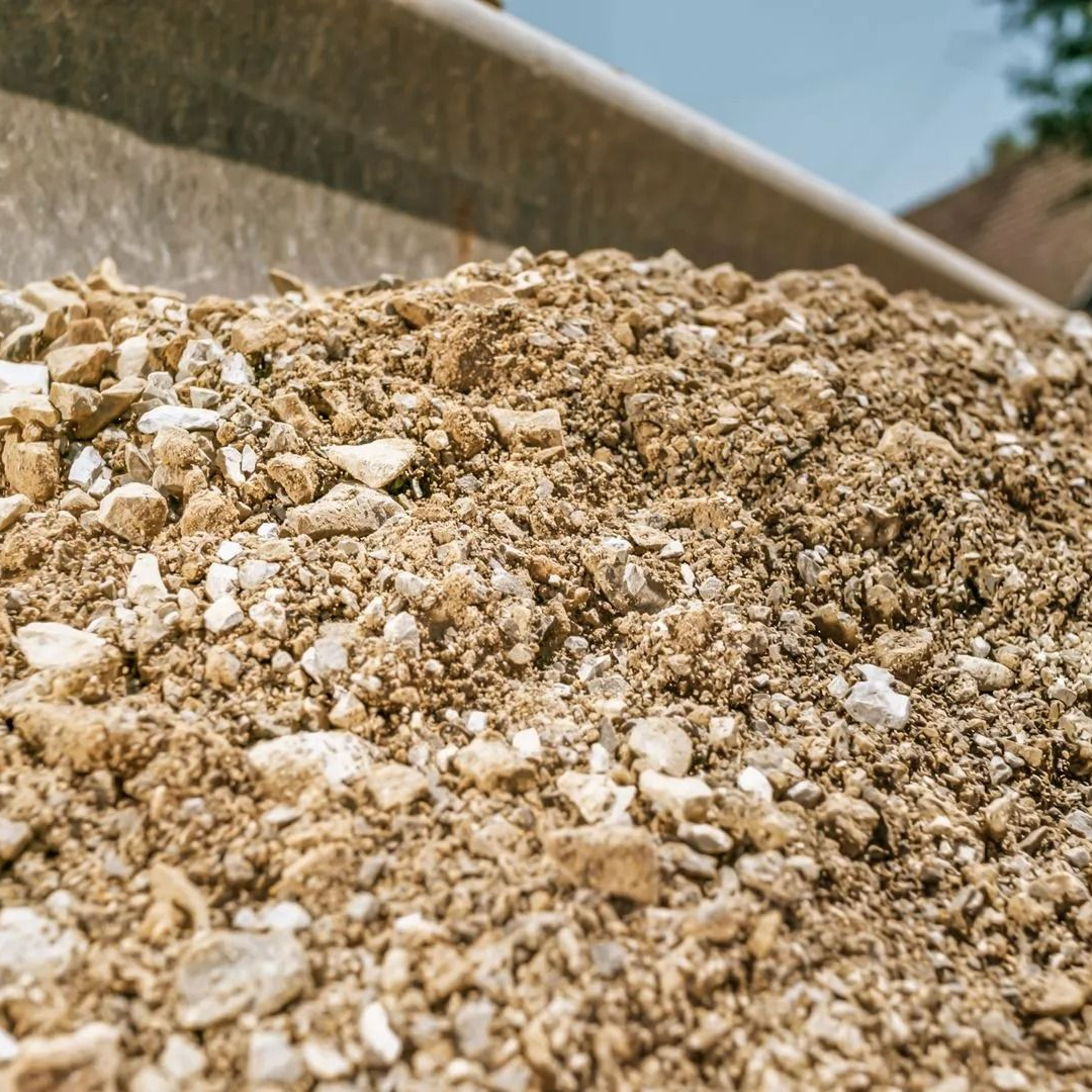 A pile of cream-colored rocks, under the sun.