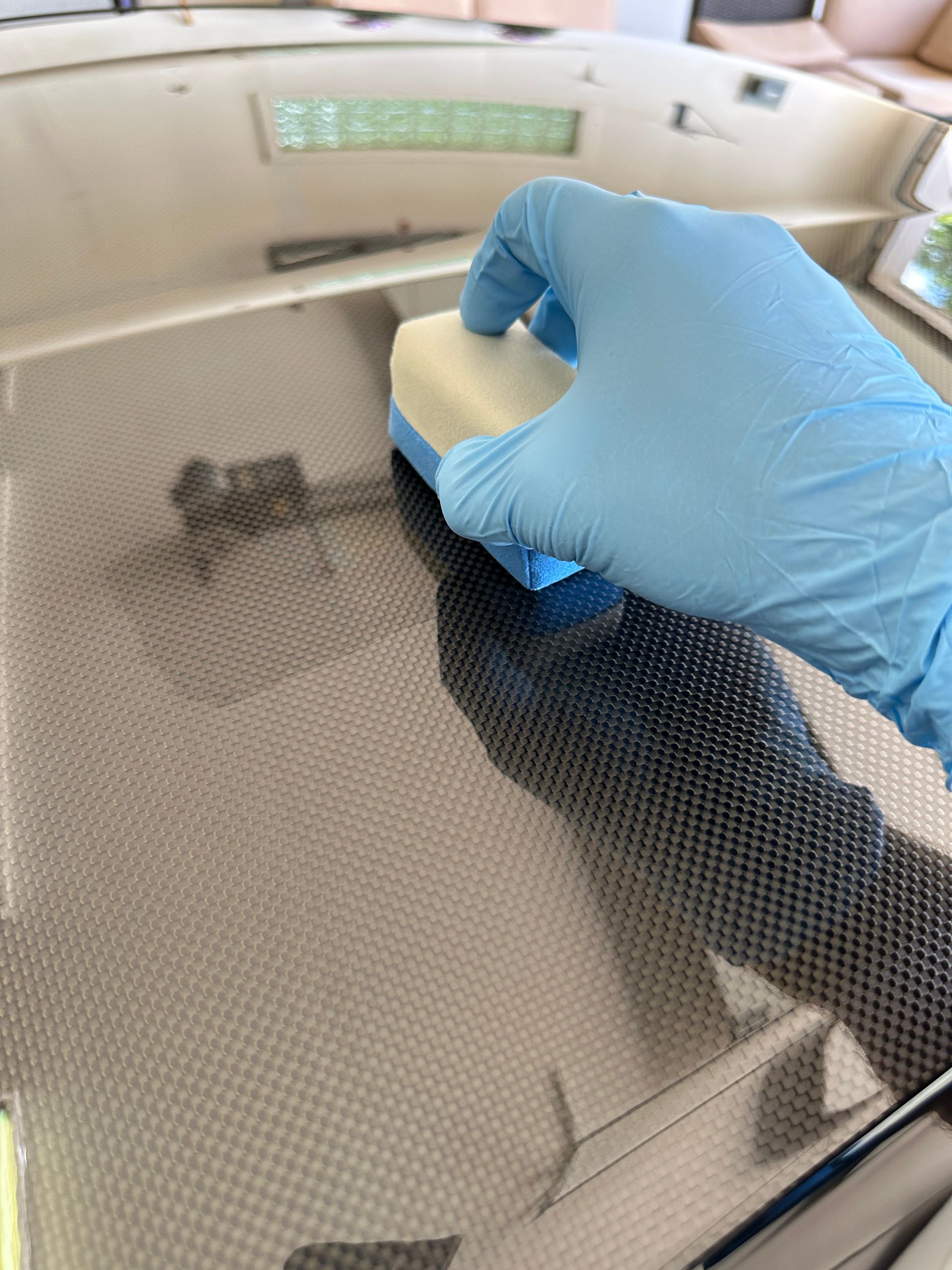 A close up of water drops on a black surface