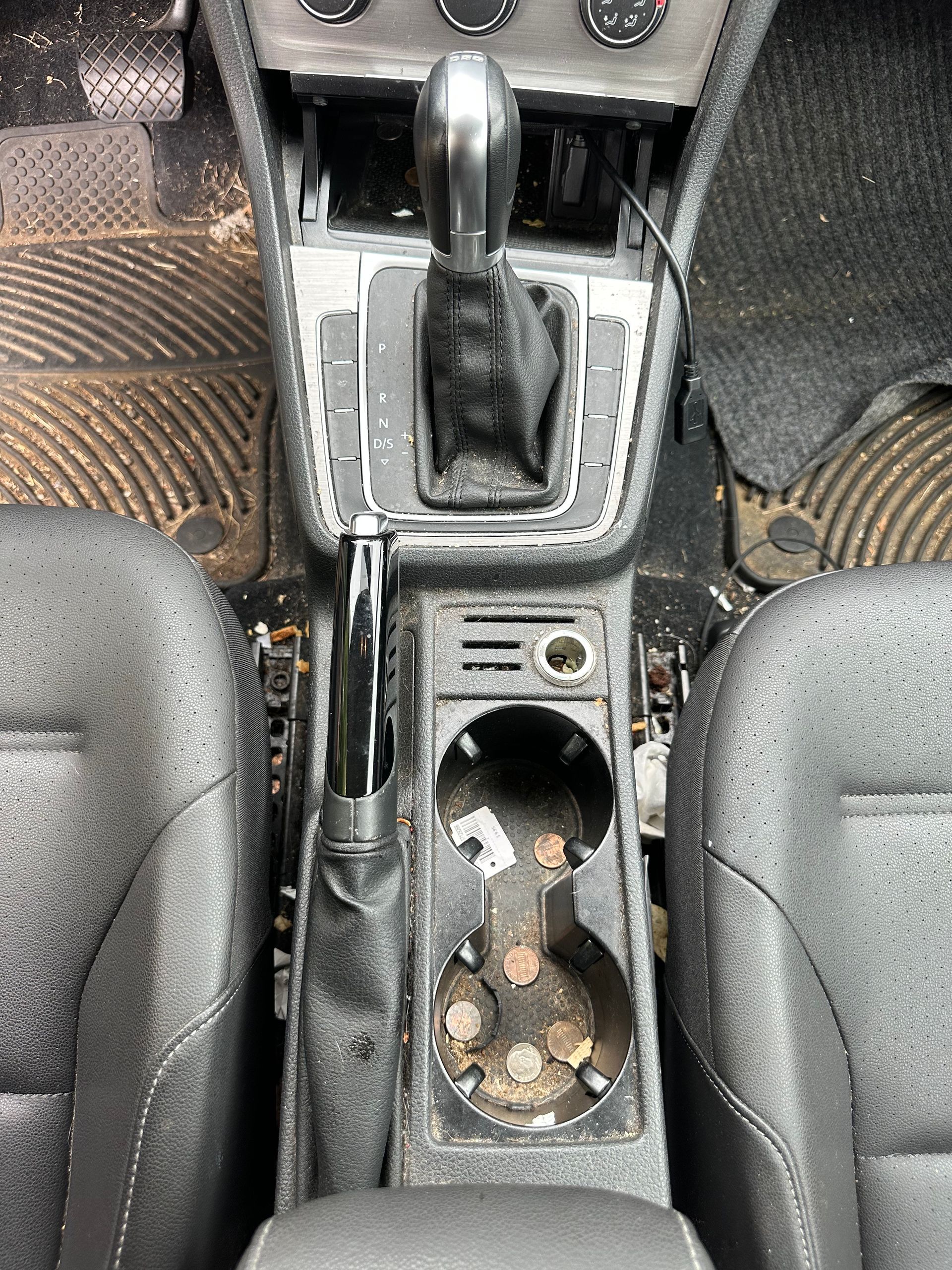 The engine of a toyota rav4 is shown with the hood up.