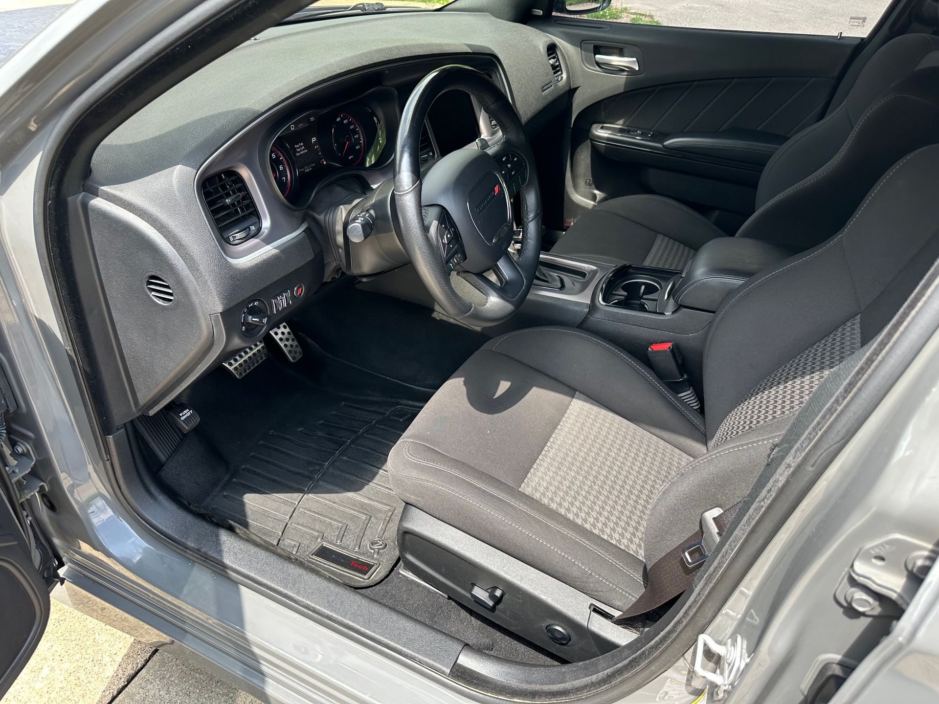The engine of a toyota rav4 is shown with the hood open.