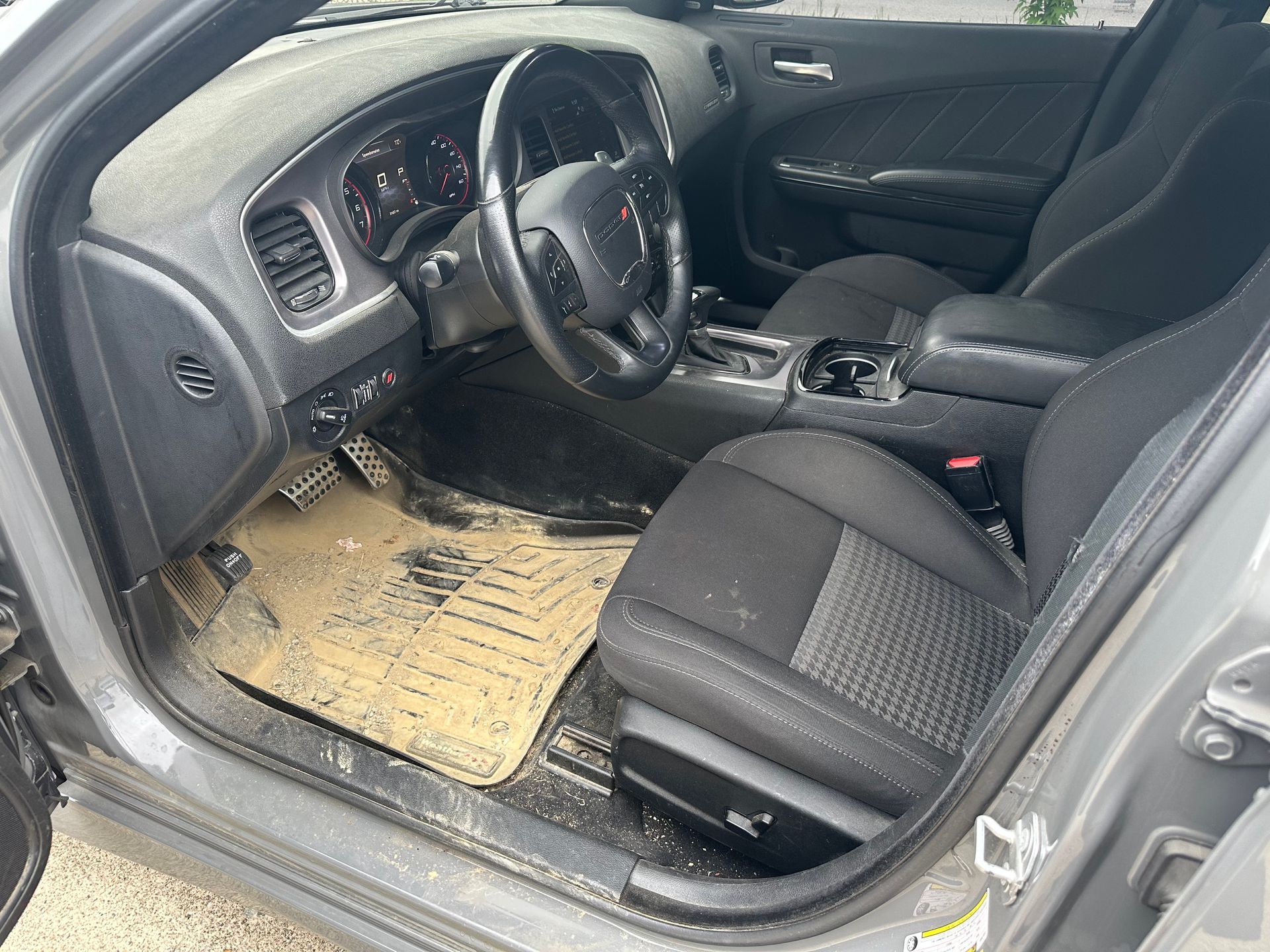 The engine of a toyota rav4 is shown with the hood up.
