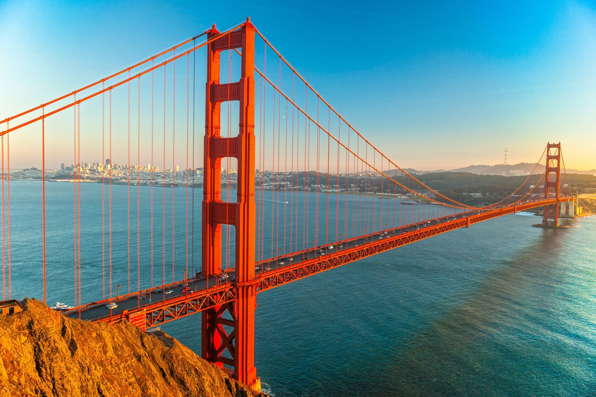 The golden gate bridge is a suspension bridge over a body of water.