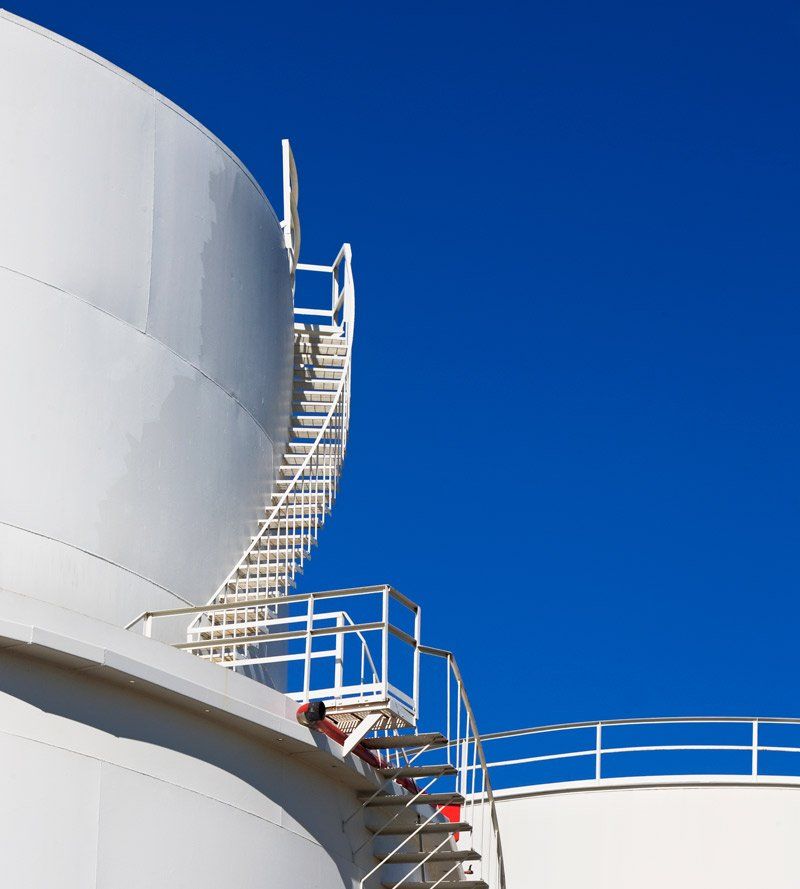 large petroleum tanks and staircases
