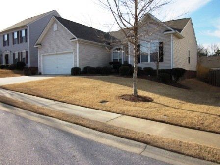 Dying Lawn & Nice Landscaping in Front of Home