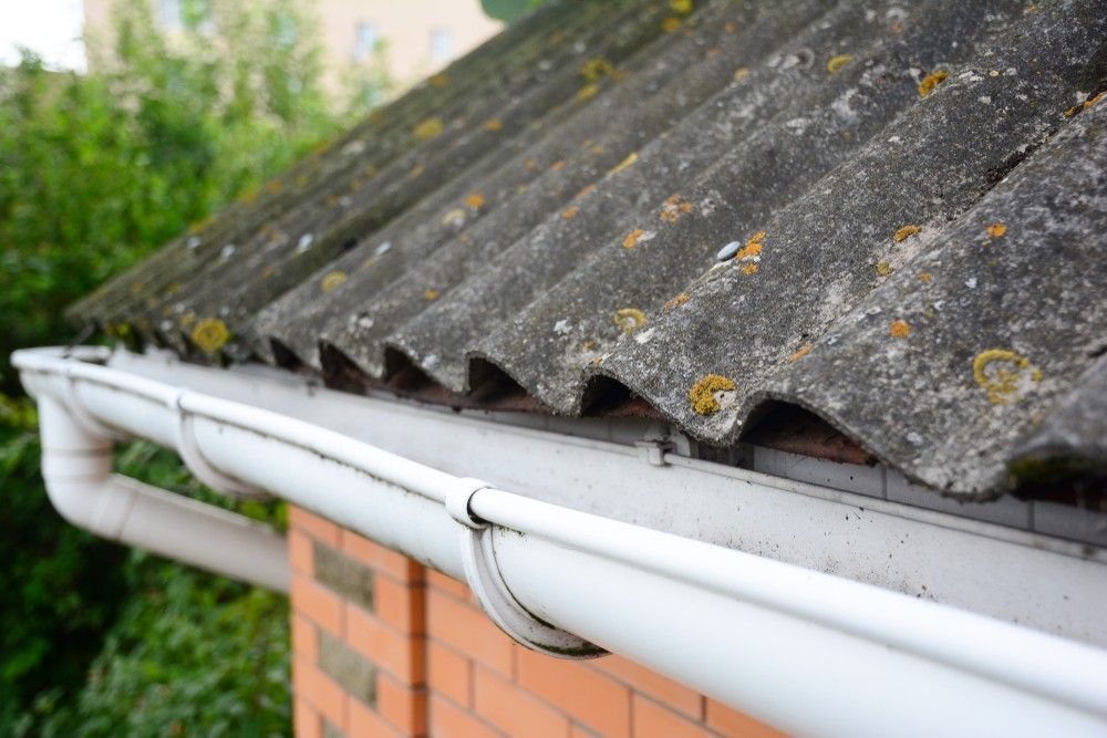 A Close Up of a Gutter on the Roof of a House — Ryno's Plumbing Group in Lakewood, NSW