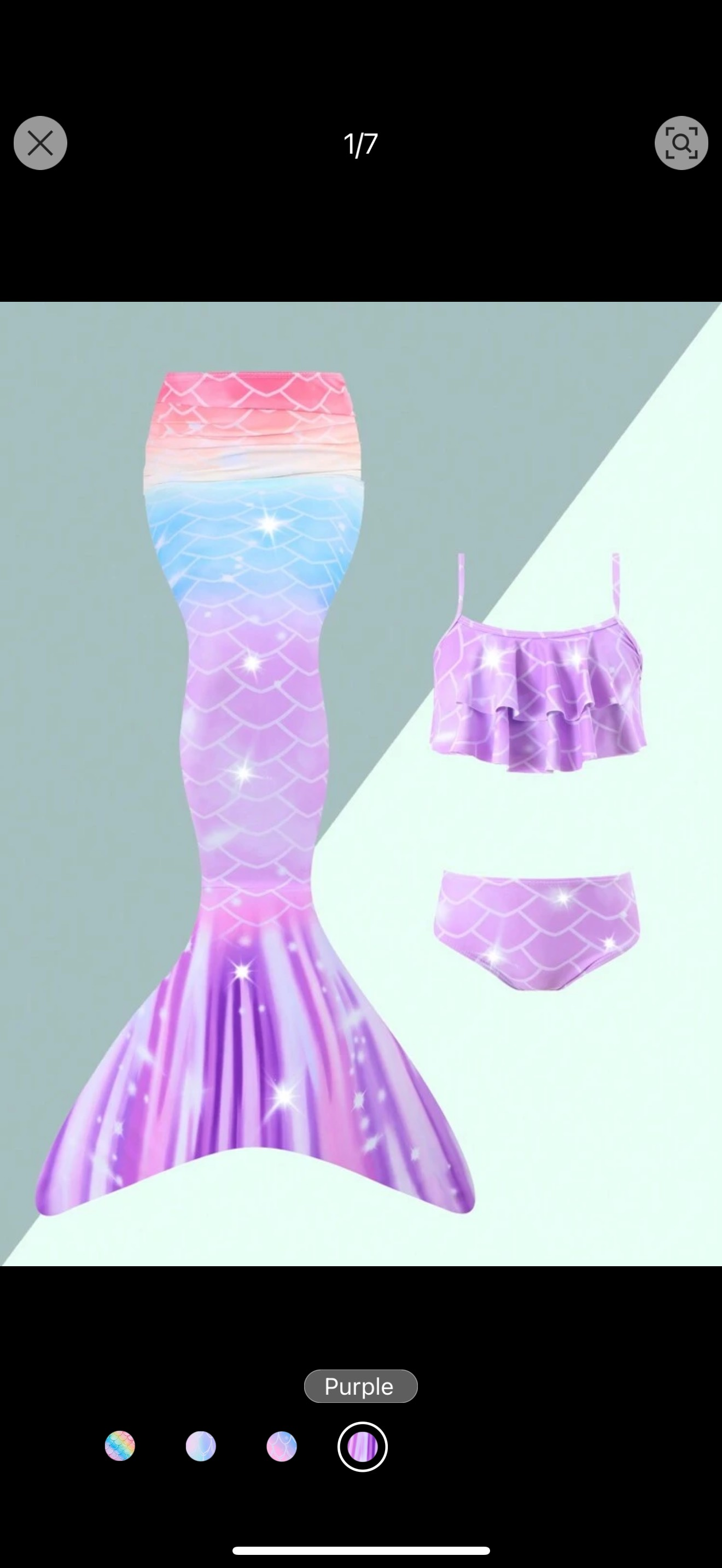 A picture of a purple mermaid tail and bikini.