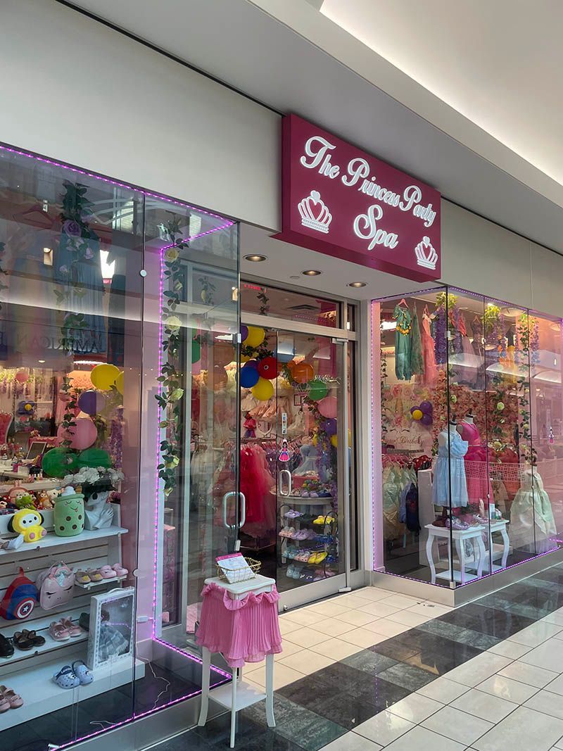 A store called the princess party and spa is in a mall.