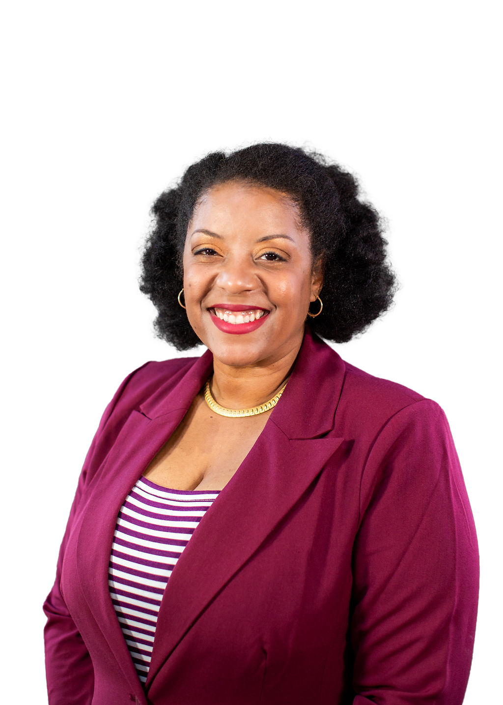 A woman in a purple jacket and striped shirt is smiling.