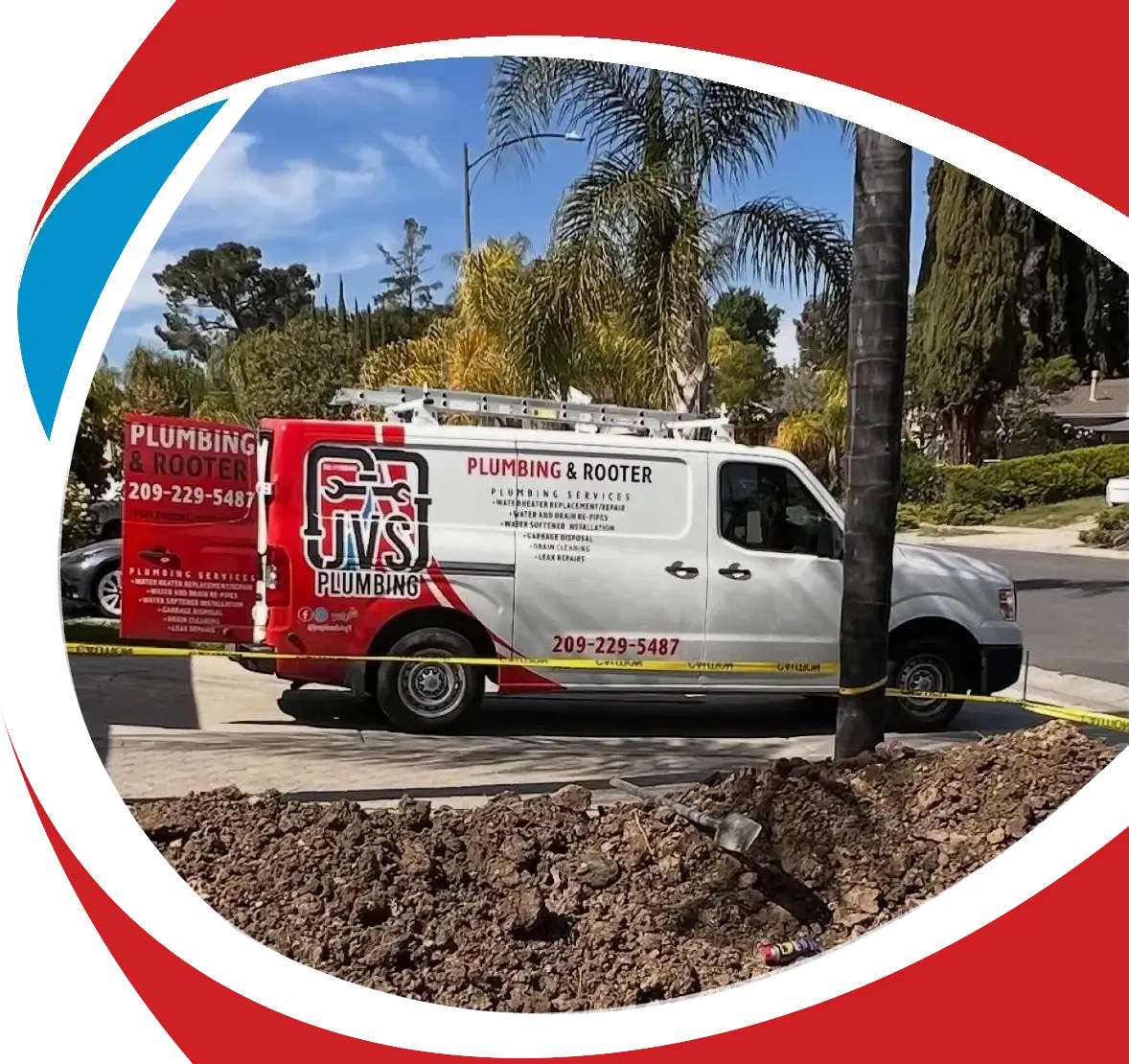 White plumbing service van parked on a street, with red-and-white company branding and a tree in front.