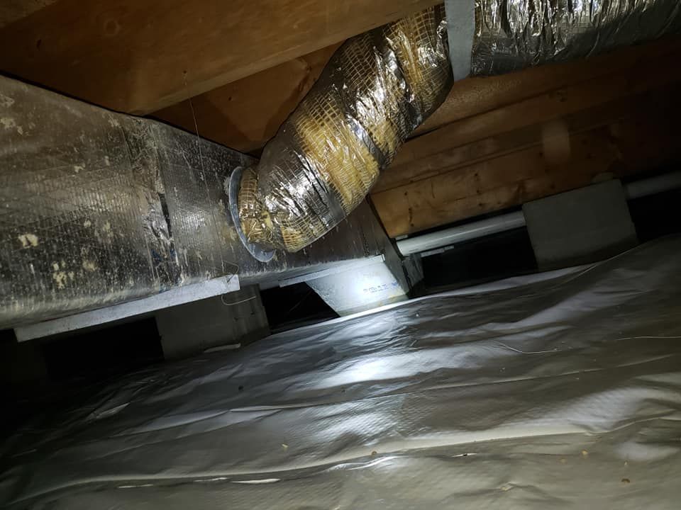 There is a duct in the ceiling of a house.