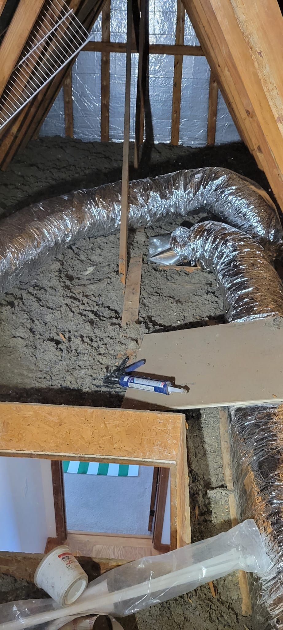 There is a hole in the ceiling in the attic.