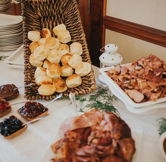 breakfast-catering-table-with-homemade-biscuits-jams-breakfast-meats.