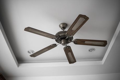 a black metal ceiling fan