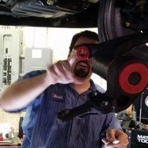 Auto A/C Service — Worker Repairing Car in Orange Park, FL