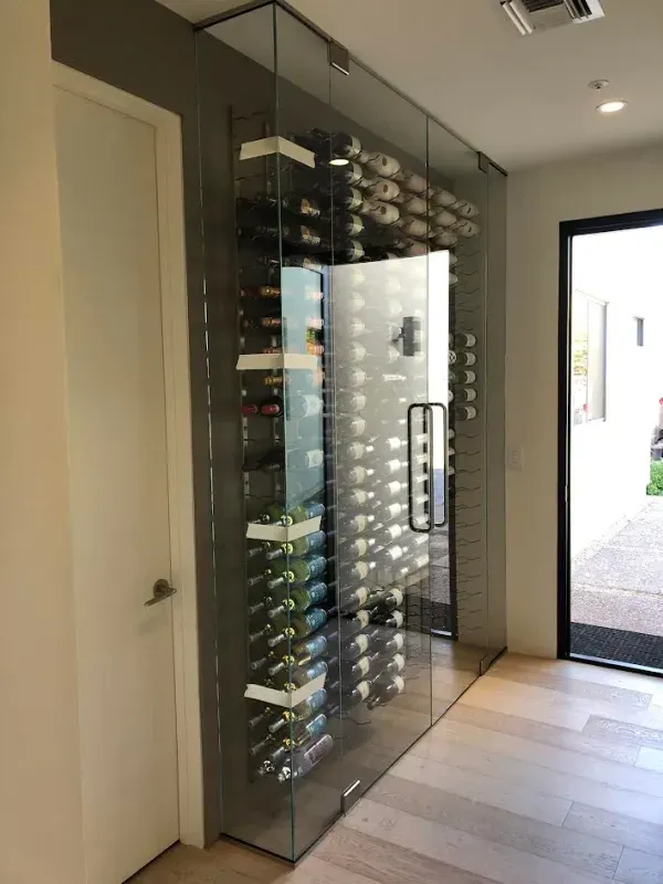 A wine cellar with lots of bottles in it