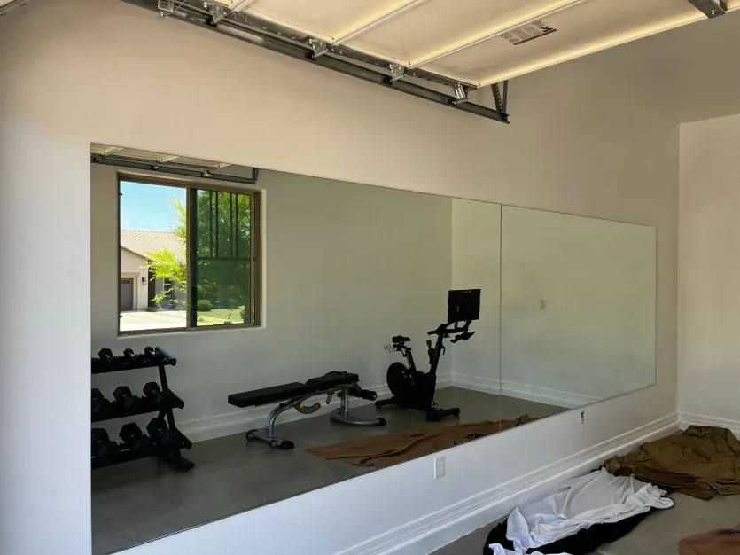 There is a large mirror in the middle of the room.