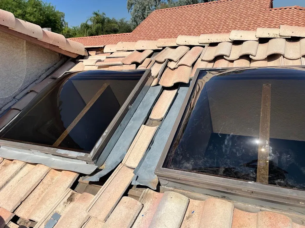 Two skylights on the roof of a house