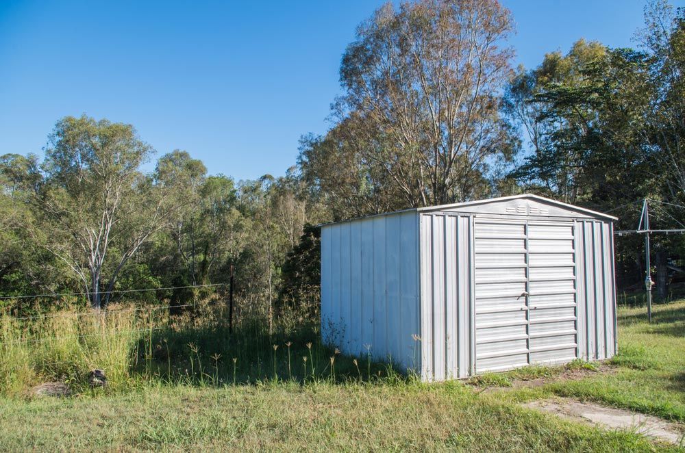 Australian Tin Shed In A Rural Backyard — Garages & Sheds in Coffs Harbour, NSW