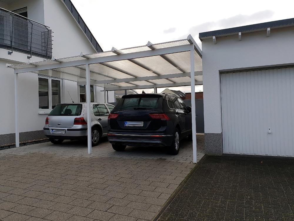 Carport With Two Cars — Garages & Sheds in Woolgoolga, NSW