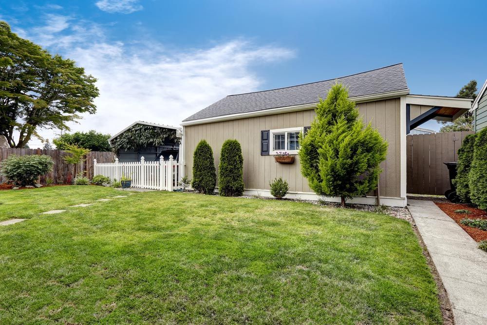 Large Backyard And Carport — Garages & Sheds in Woolgoolga, NSW