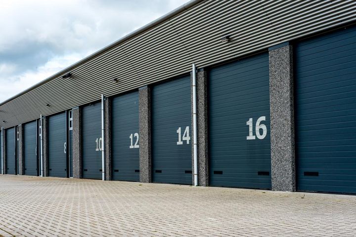 Grey Storage Roller Doors — Garages & Sheds in Coffs Harbour, NSW