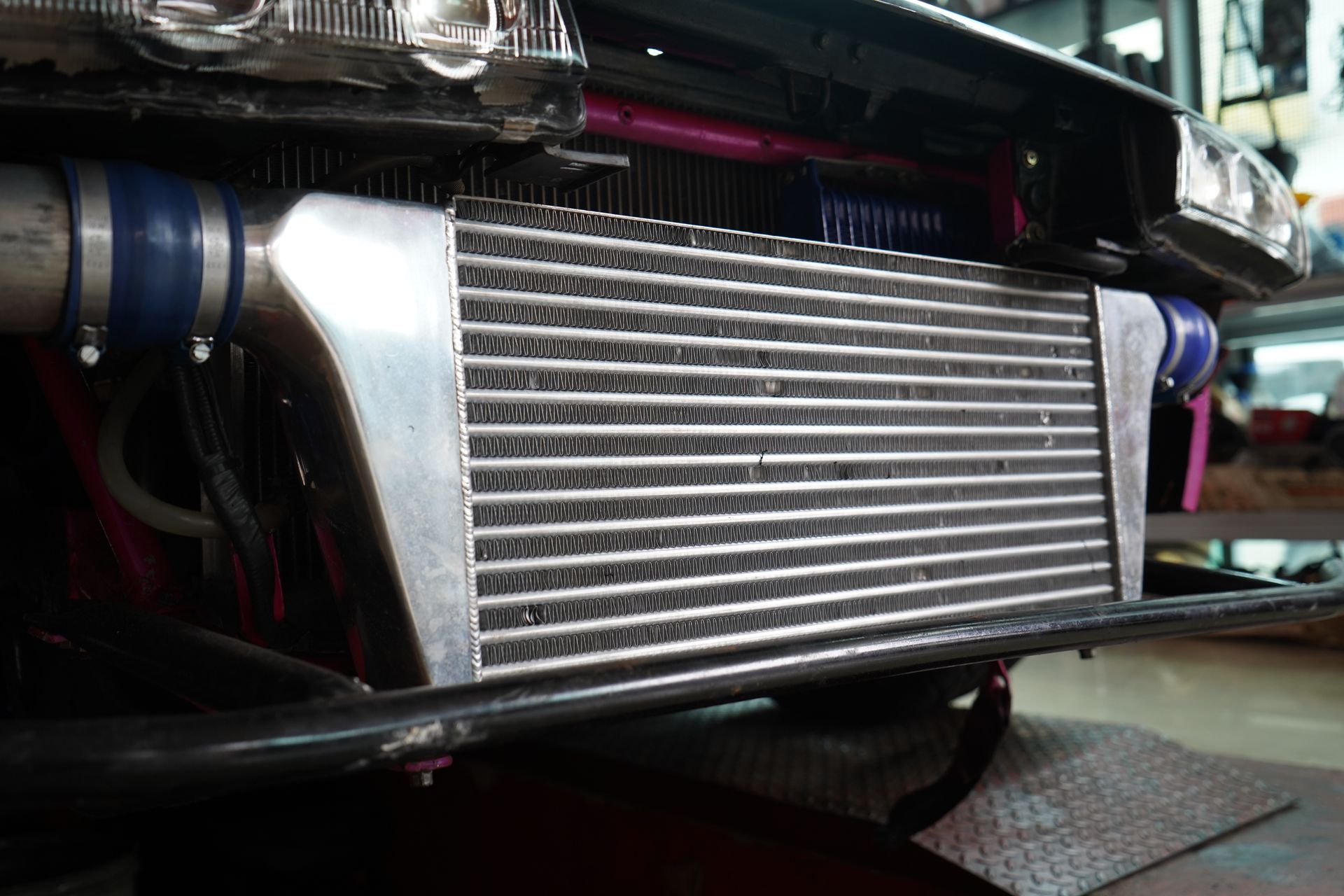 A Car's Intercooler Is Visible Behind the Bumper — Wallsend Automotive in Maryland, NSW