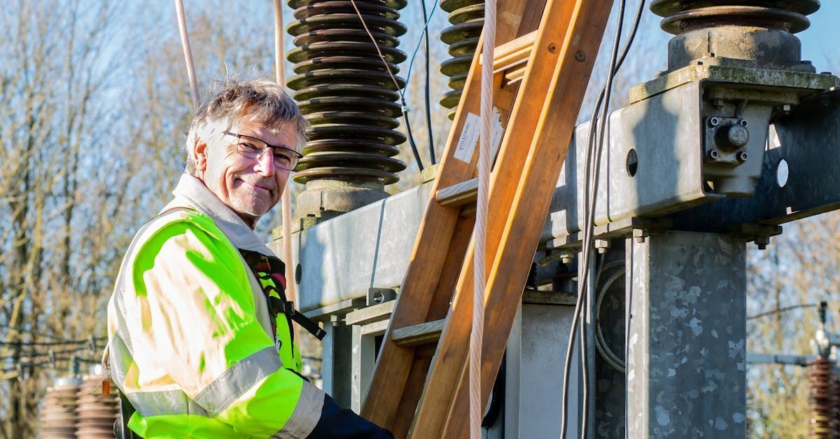 electrical technician repairing transformer