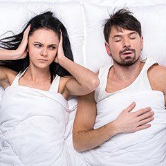 Married Couple In Bed — The Center for Sleep Apnea and TMJ — Boise, ID
