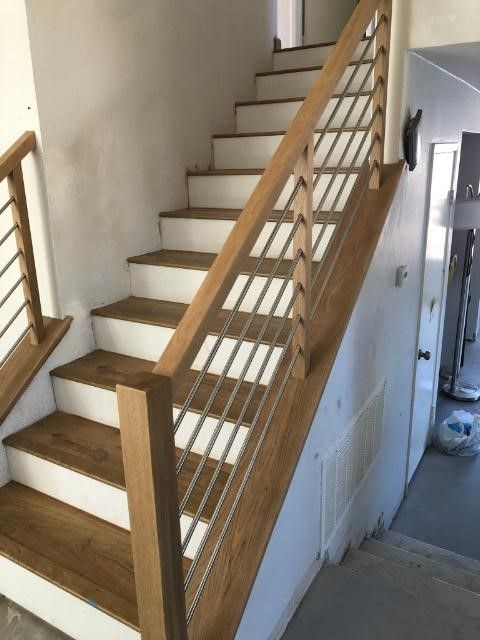 modern stair banister with stainless steel horizontal rod balusters