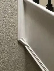 Painted Wall Paneling with decorative trim