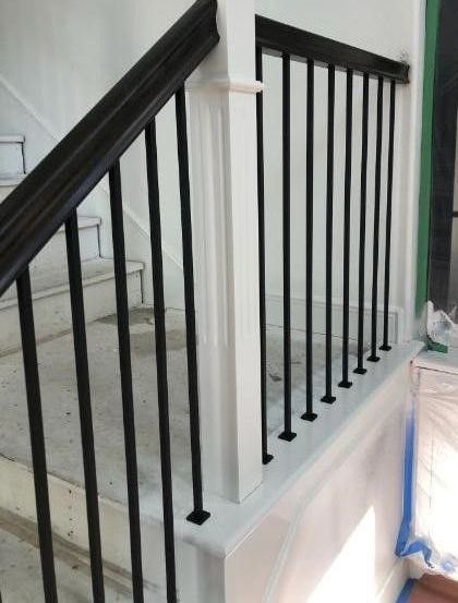 Painted Post with Black Stained Hand Railing and Black Iron Balusters with Flat Shoes