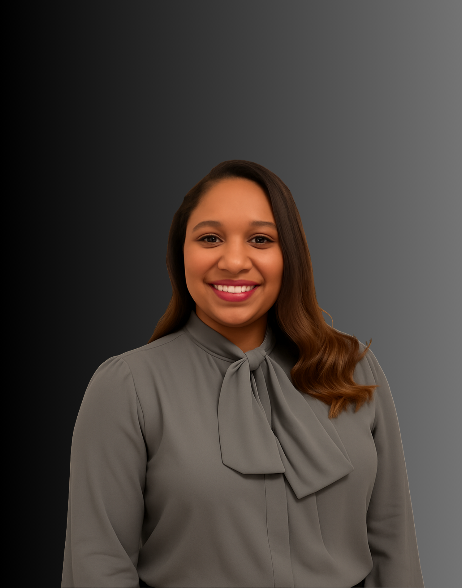 Woman with glasses, arms crossed, wearing a black blazer and dress, smiling.