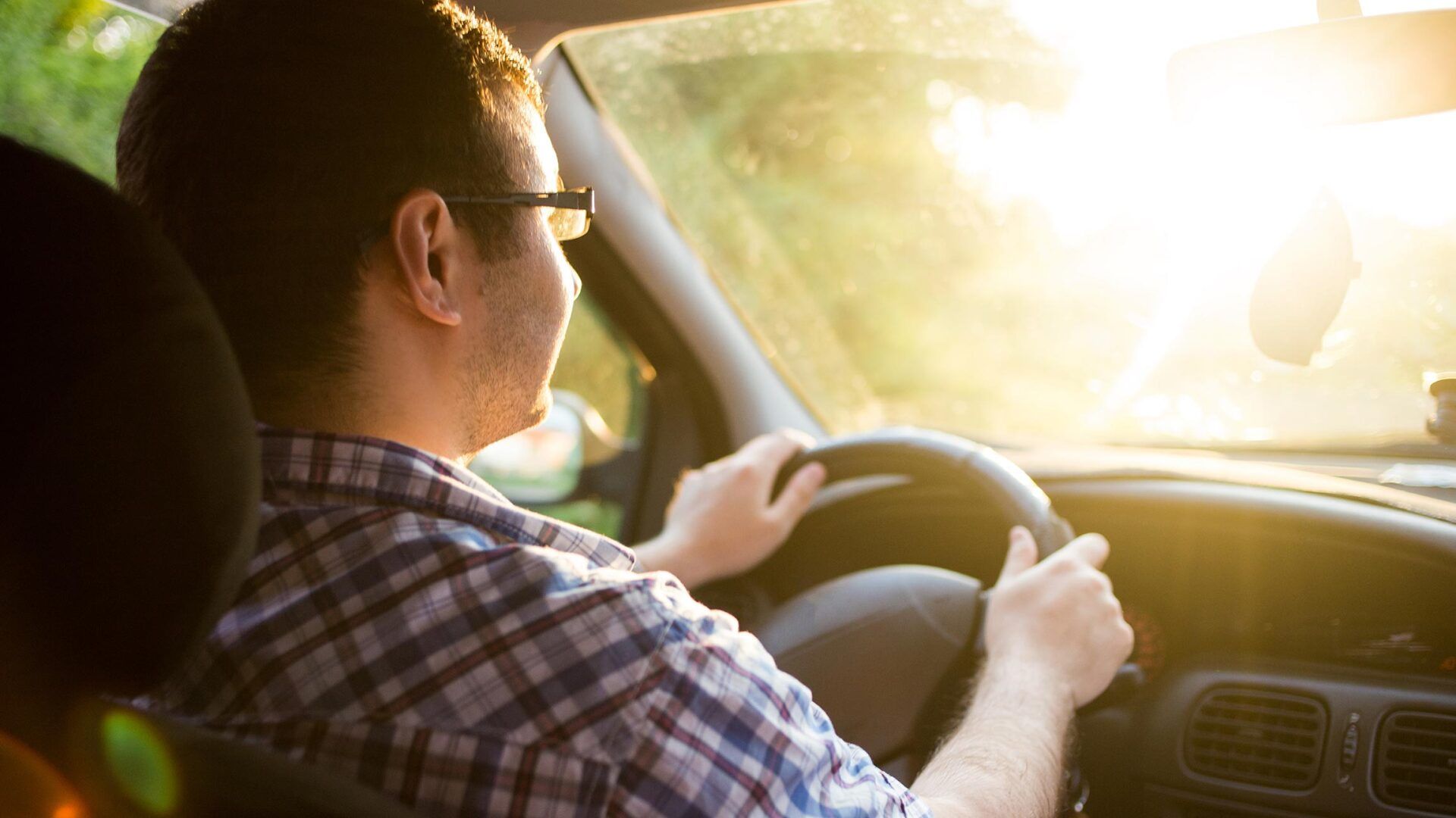 Man Driving Under the Sunny Day — Roseville, CA — Frank Penney Injury Lawyers