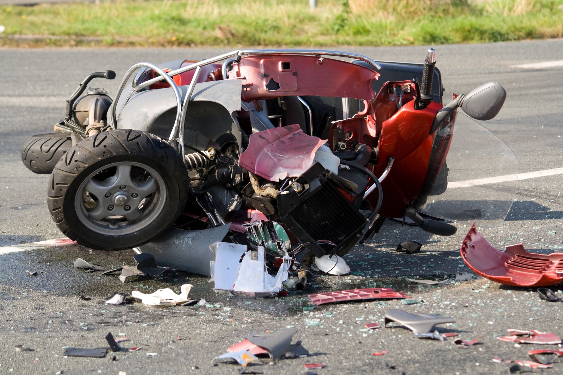Picture of a motor scooter after an accident. Picture of a motor scooter after an accident.