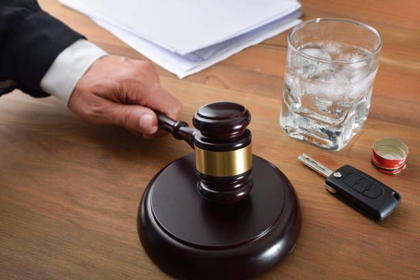 A judge is passing a sentence for drunk driving.