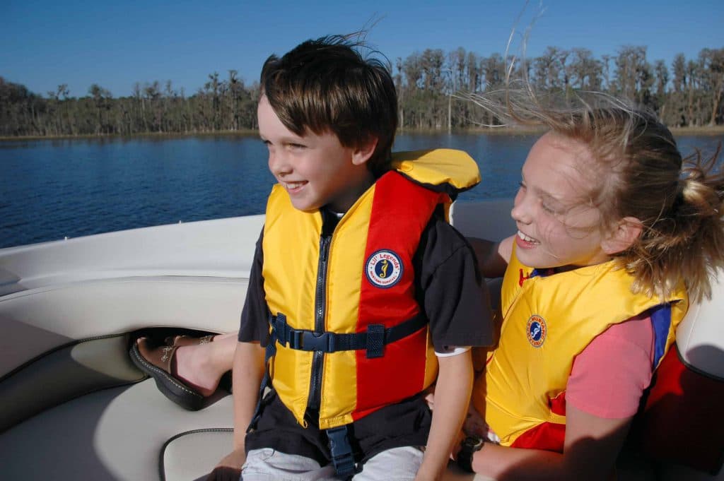 Kids Enjoying in Boat — Roseville, CA — Frank Penney Injury Lawyers