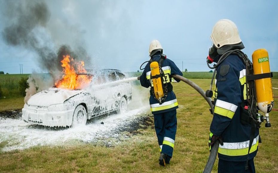 Firefighters and a Burning Car — Roseville, CA — Frank Penney Injury Lawyers