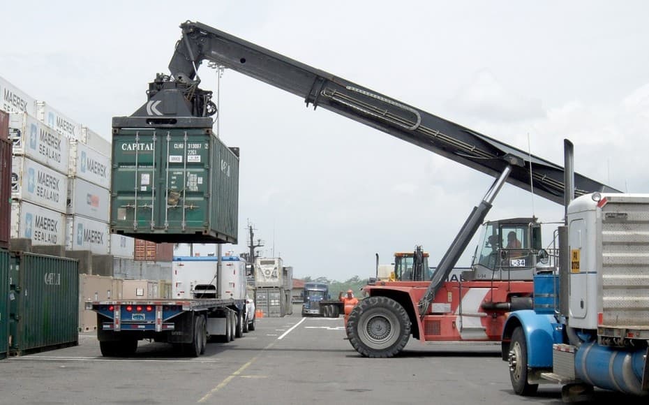 Commercial Truck Lifting a Container — Roseville, CA — Frank Penney Injury Lawyers