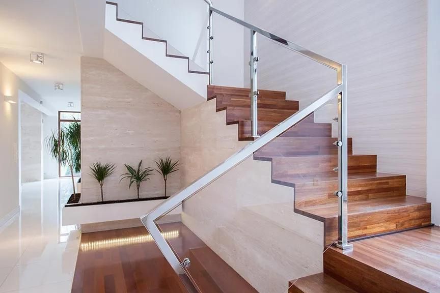 A Modern Staircase with Wooden Steps and A Glass Railing — City Glass Newcastle in Maitland, NSW