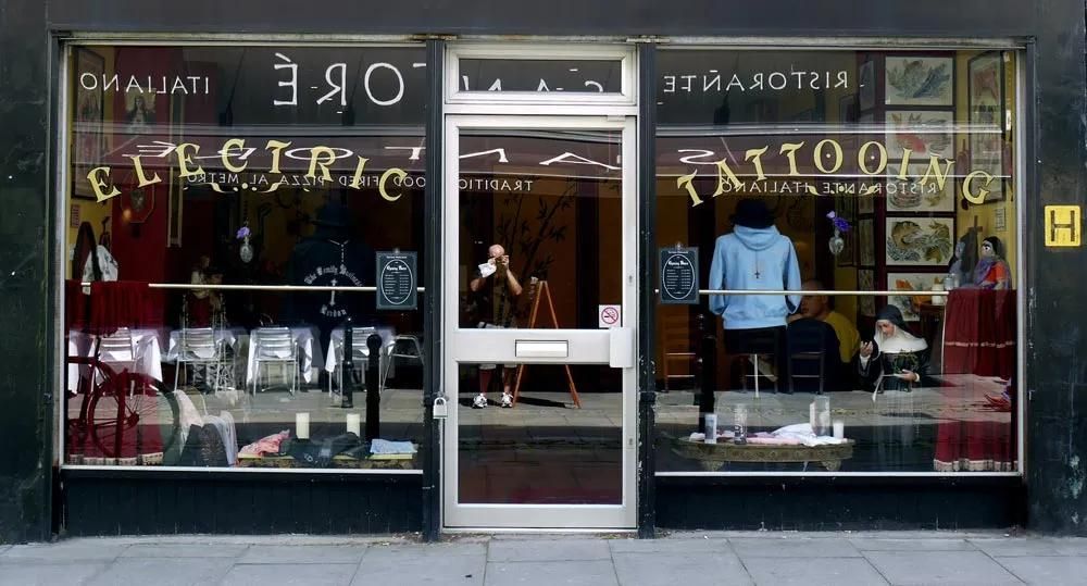 A Store Front with The Word Electric on It — City Glass Newcastle in Port Stephens, NSW