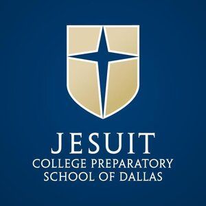 Jesuit College Preparatory School of Dallas logo: gold shield with a star on a dark blue background.