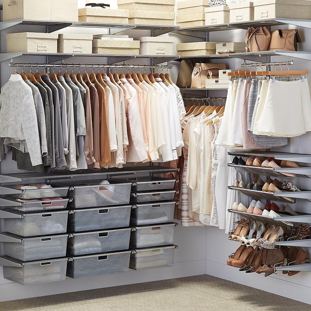 Walk-in closet organized with clothes, shoes, and storage boxes; beige, white, and gray colors.— Ezyshelf in Rockhampton, QLD
