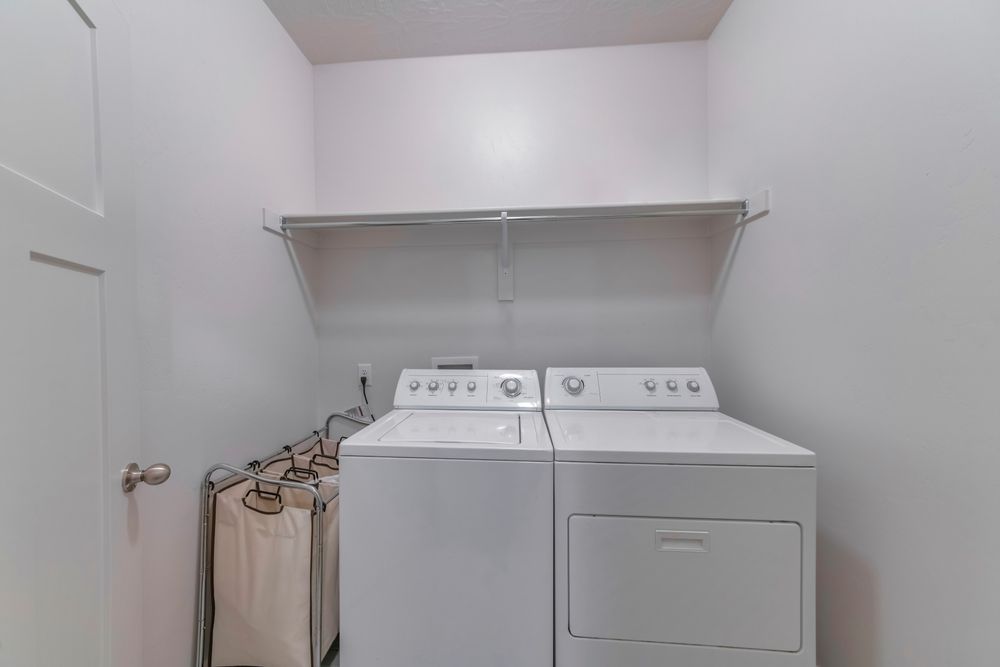 White Washer and Dryer in a Laundry Room — Ezyshelf in Mackay, QLD 