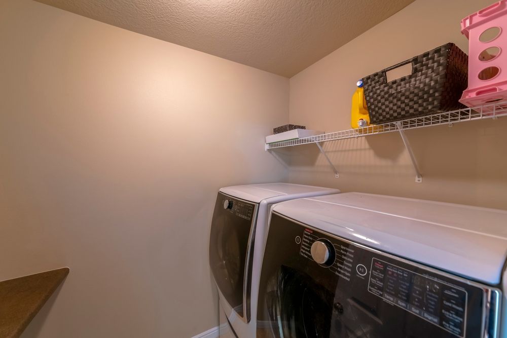 Washer and Dryer in a Laundry Room — Ezyshelf in Sunshine Coast, QLD