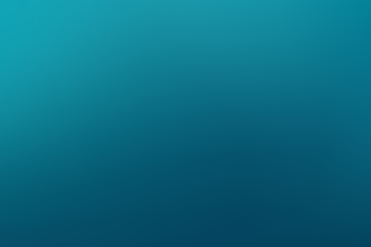 A group of people are sitting in a circle talking to each other.