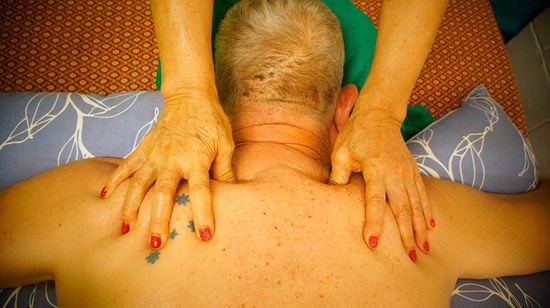 man getting  a back massage