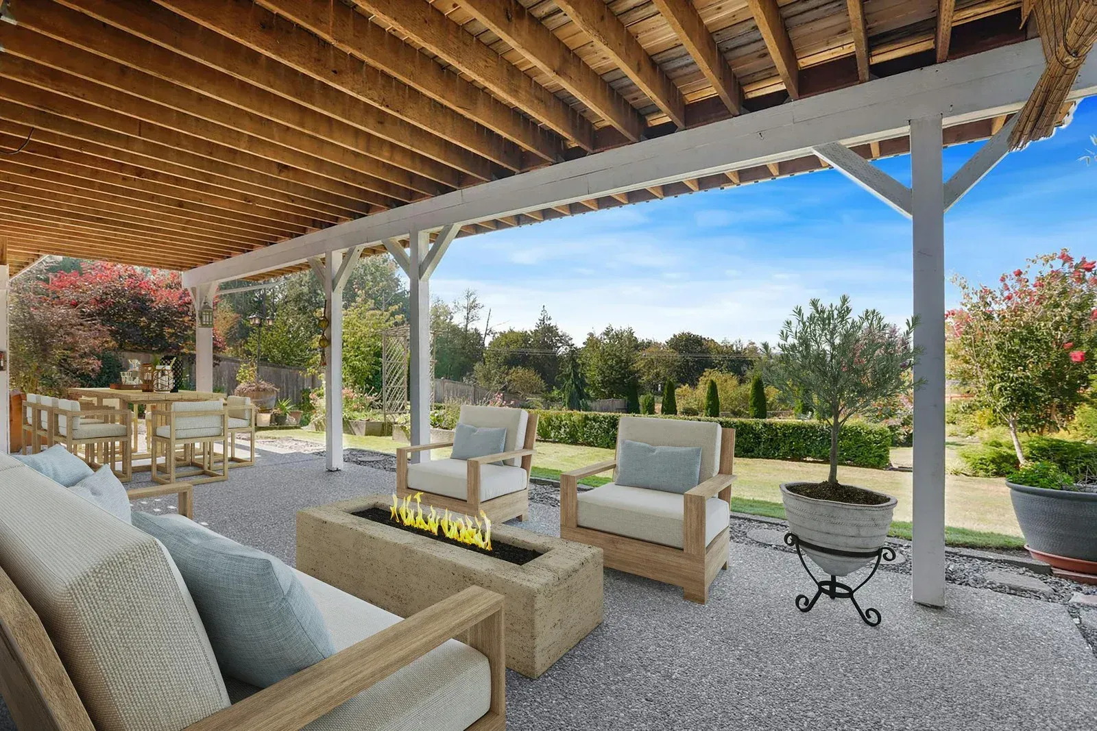 There is a fire pit in the middle of the patio.