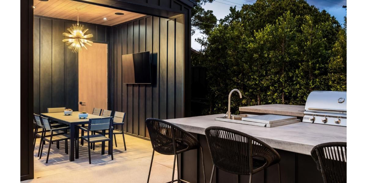 Modern outdoor kitchen in Corpus Christi featuring a sleek grill and spacious countertops.