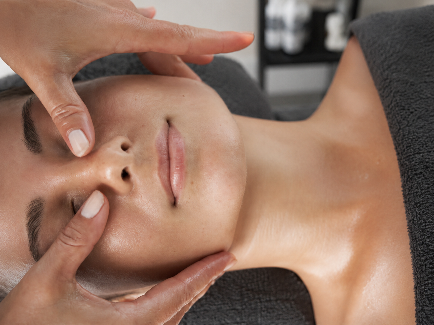 Physiotherapist performing trigger point therapy for shoulder pain