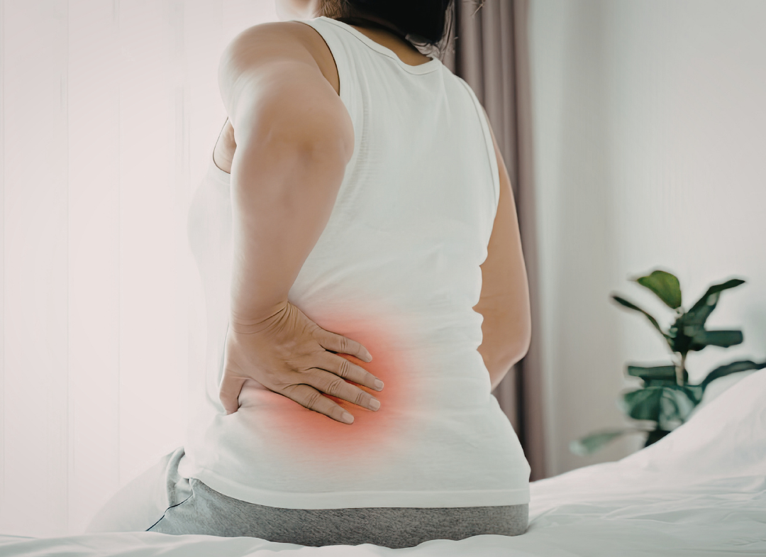 woman experiencing back pain